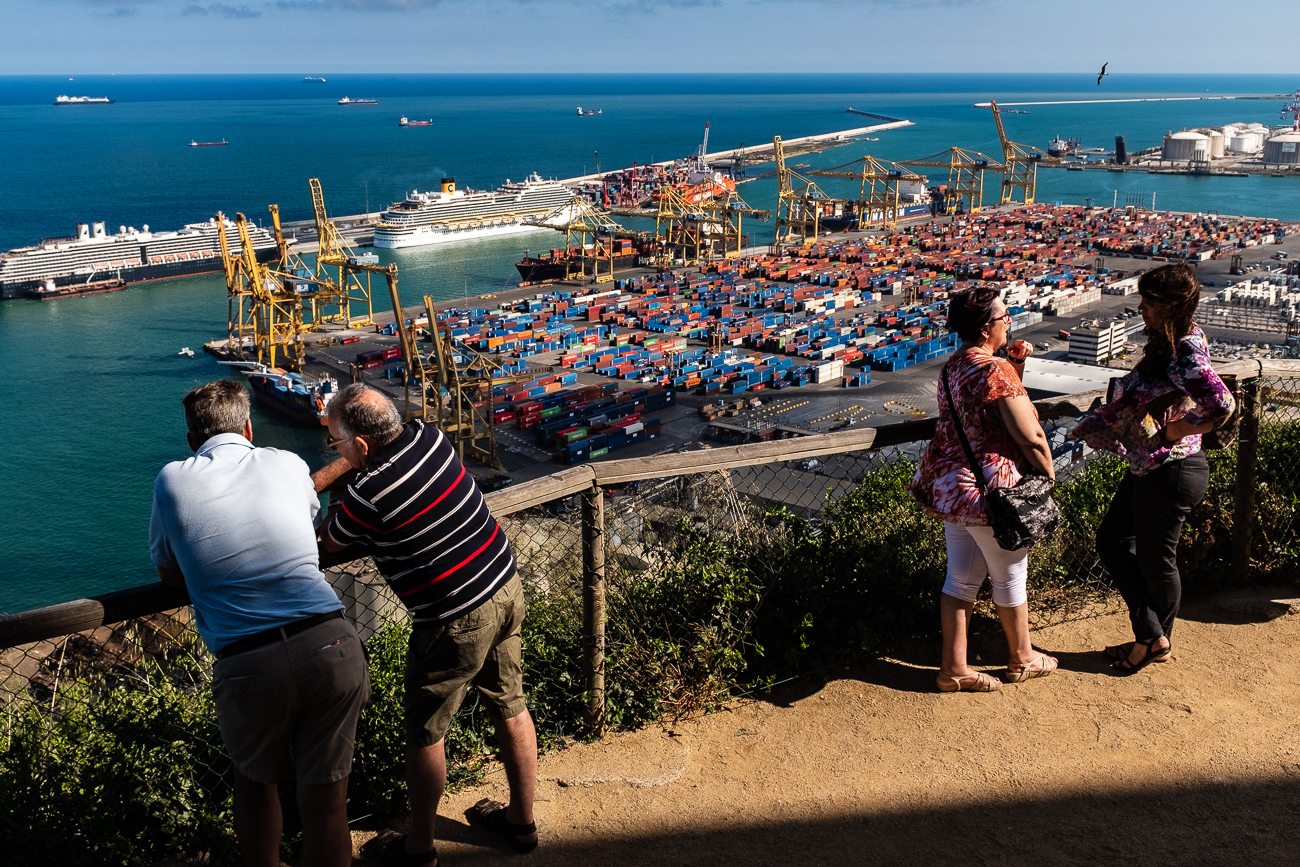 People enjoying the view over the port of Barcelona, Spain.