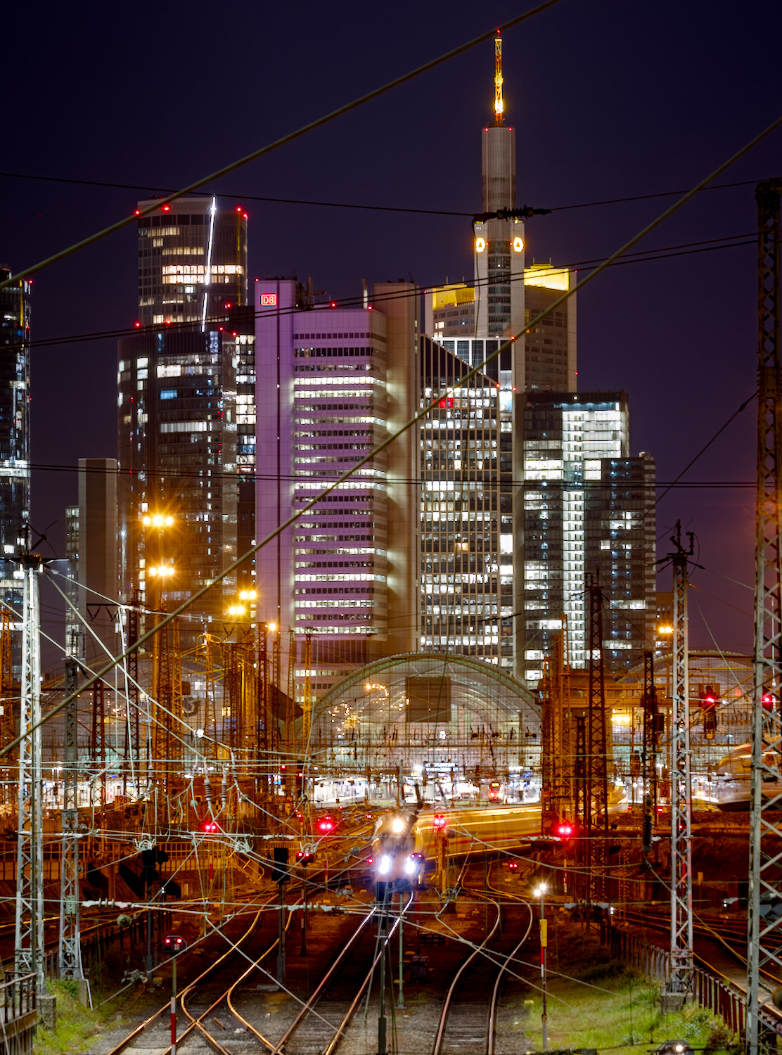 Tracks leading into the main station at night, Frankfurt am Main, Germany.